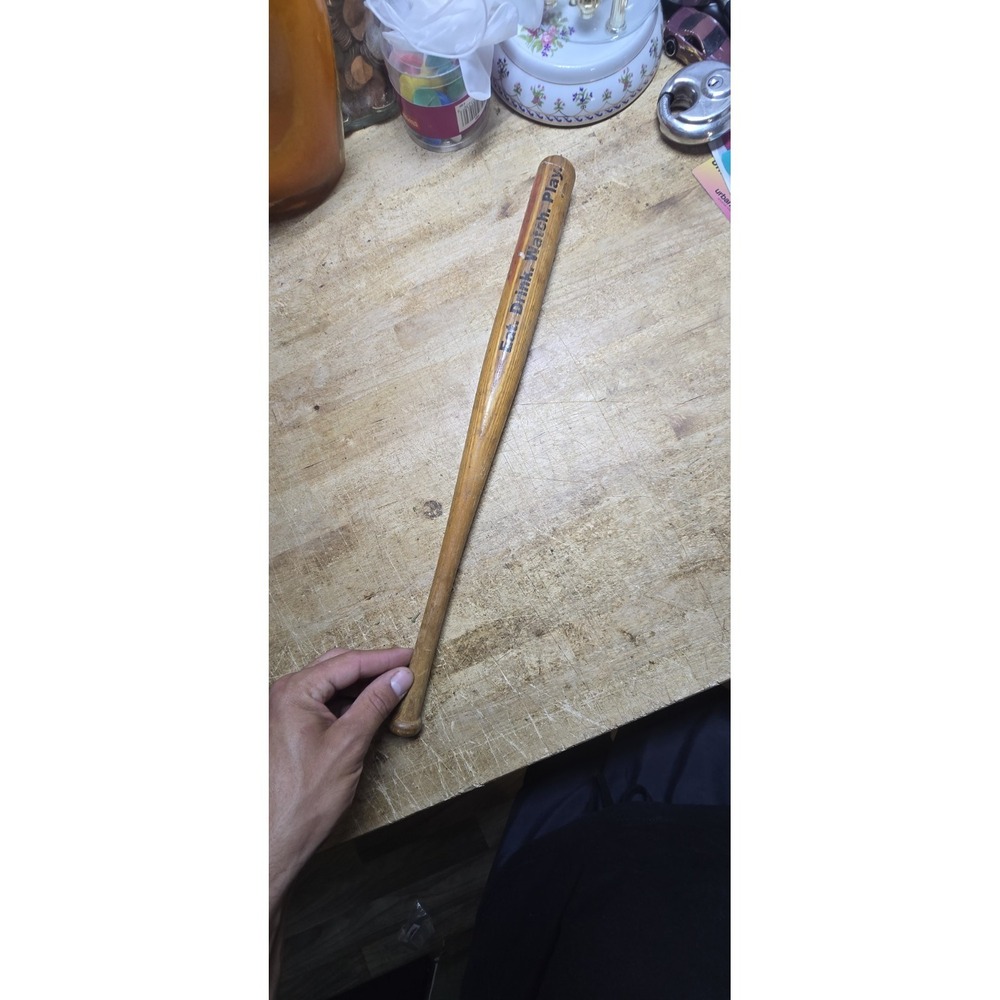 vintage wooden baseball bat featuring an ESPN branding logo